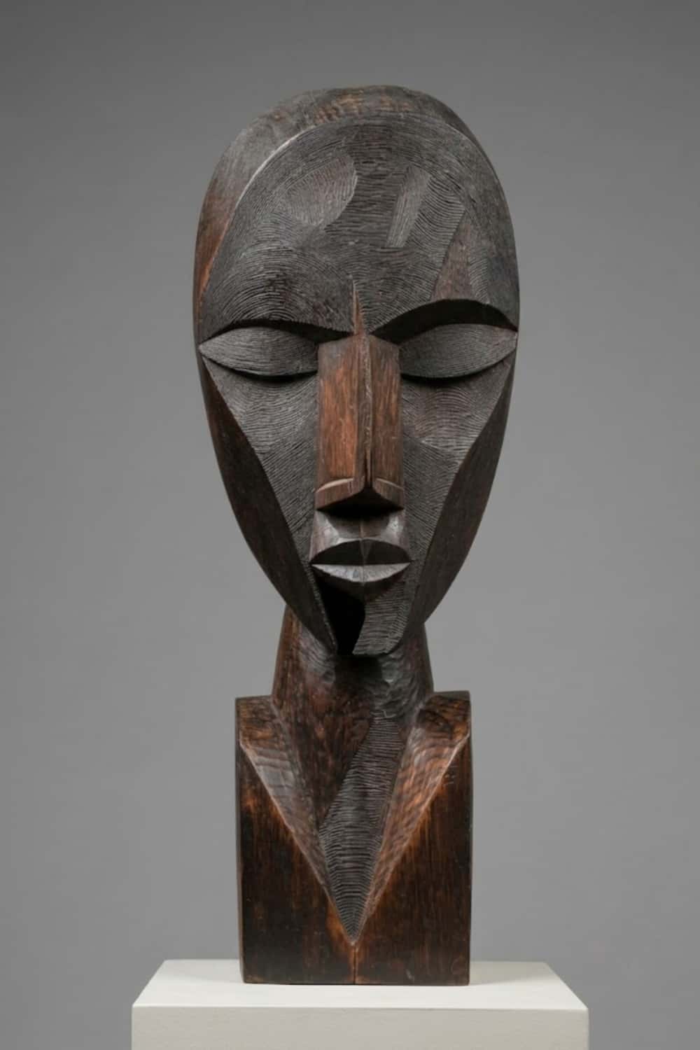 African Tribal Geometric Wooden Head Sculpture – Hand-Carved Ethnic Art Décor
